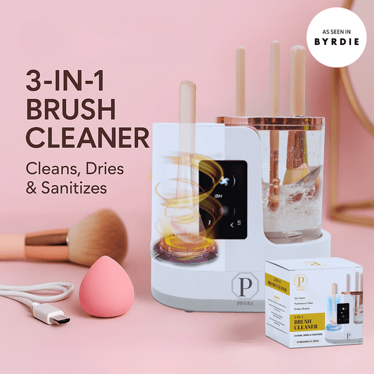 3-in-1 brush cleaner device cleans, dries, and sanitizes makeup brushes on pink background