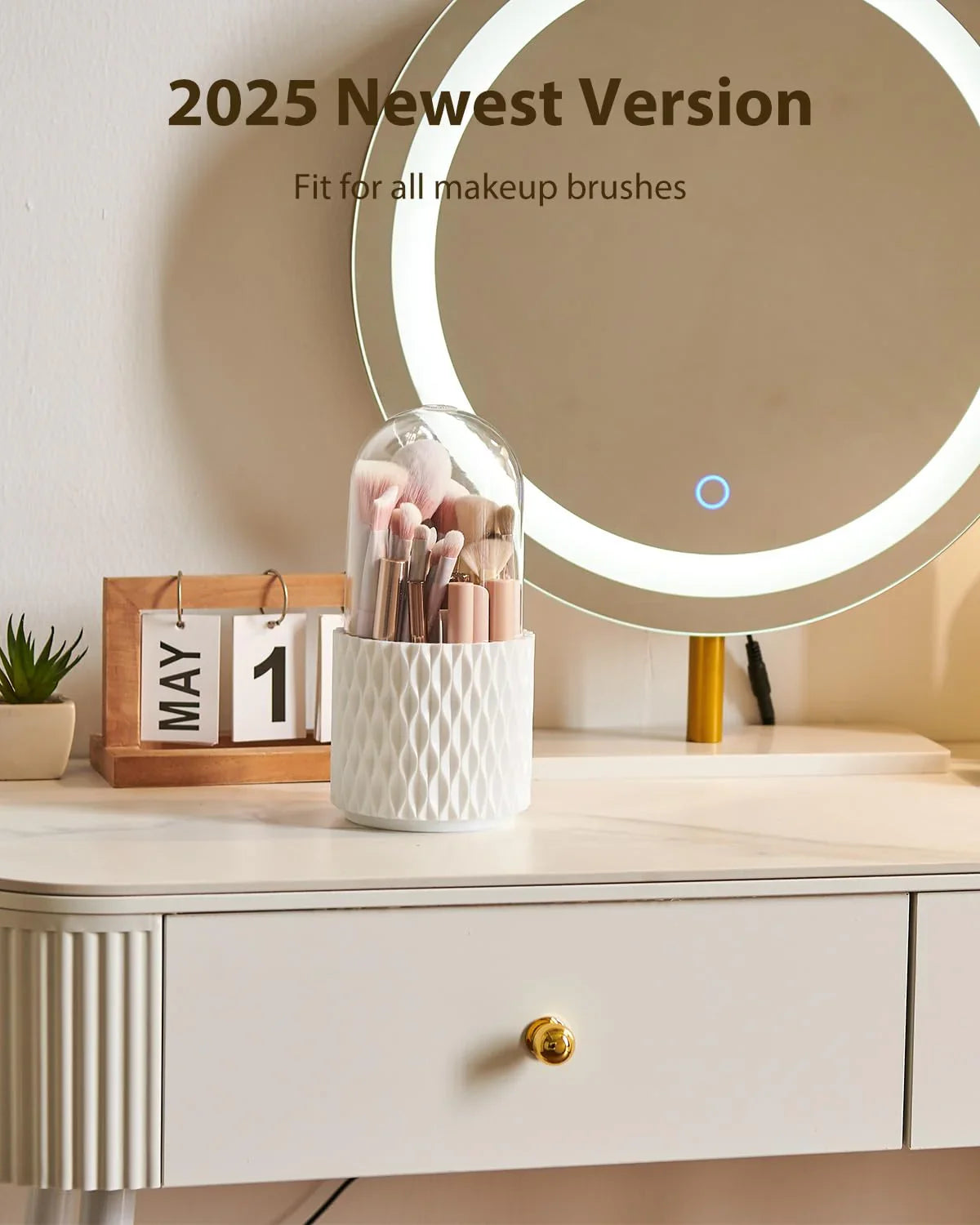 White makeup brush holder with lid on vanity table, round LED mirror in background